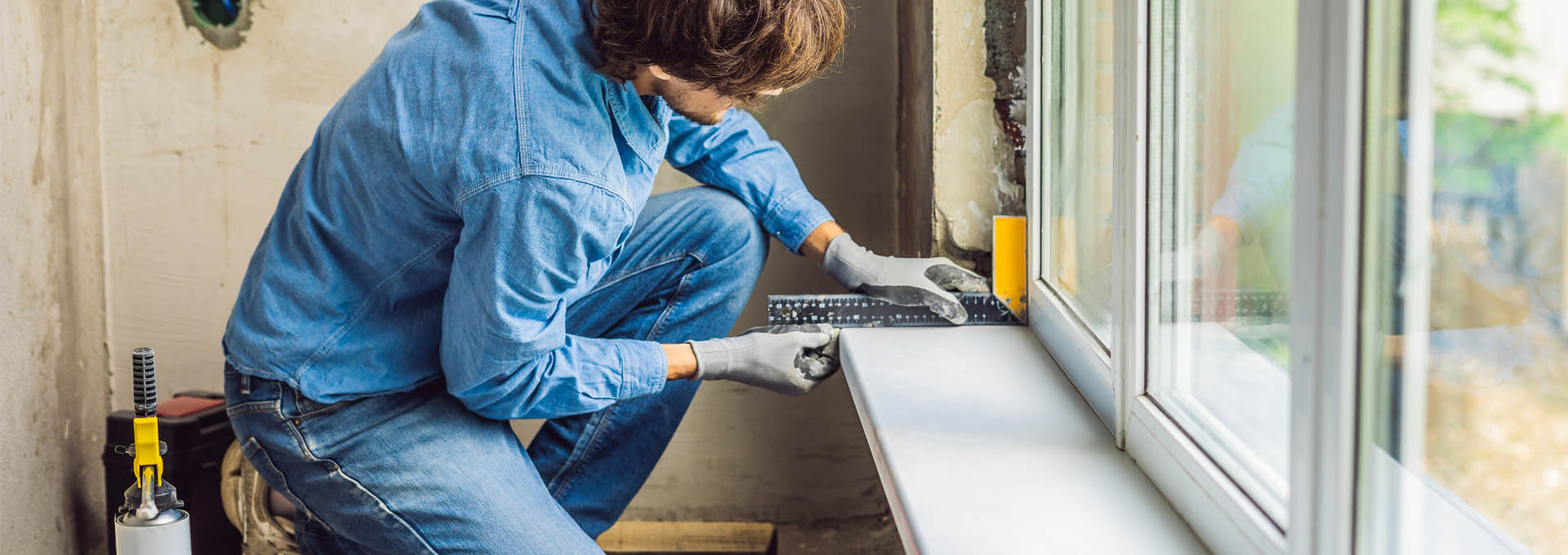 A Man Doing Window Installation